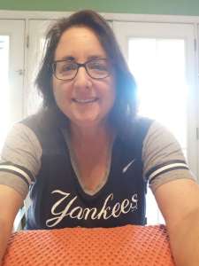 The writer wearing a Yankees jersey