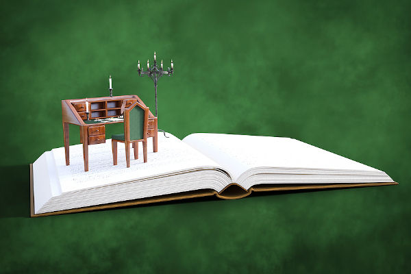 image of a secretary desk sitting on an open book