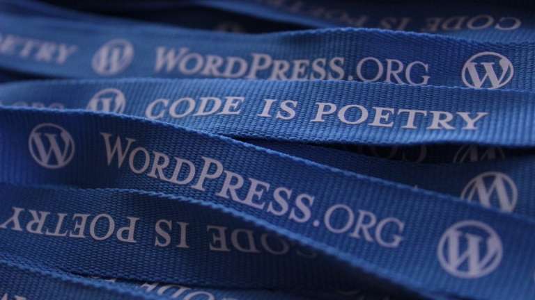 WordPress lanyards with label Code is Poetry