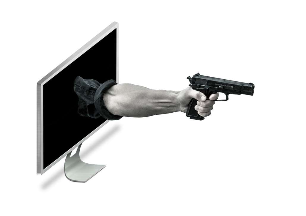 Malware image of gun coming out of a screen