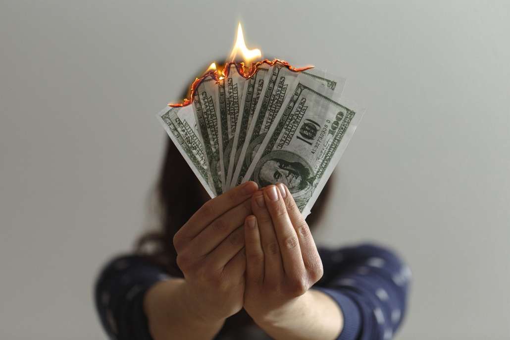 Burning Benjamin Franklin bills